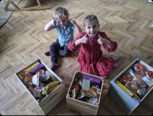 Phoebe and Lawrence making boxes of joy