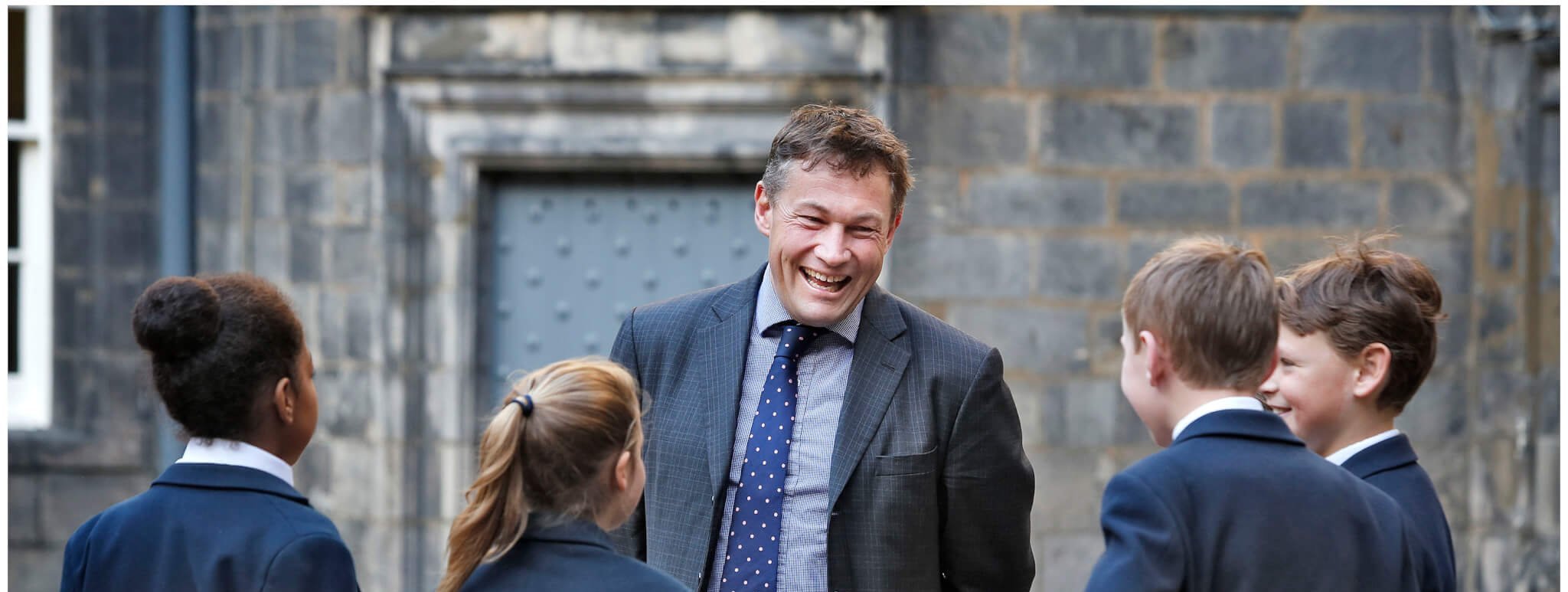 Head of Junior School with Students