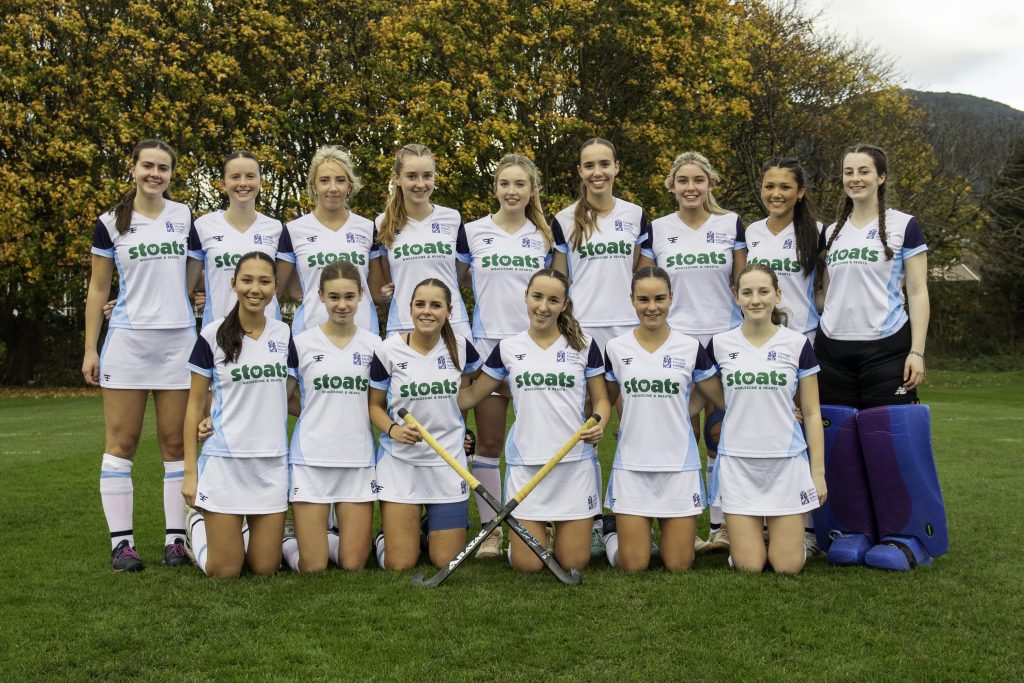 Girls' 1st XI Hockey team in Stoats branded kits