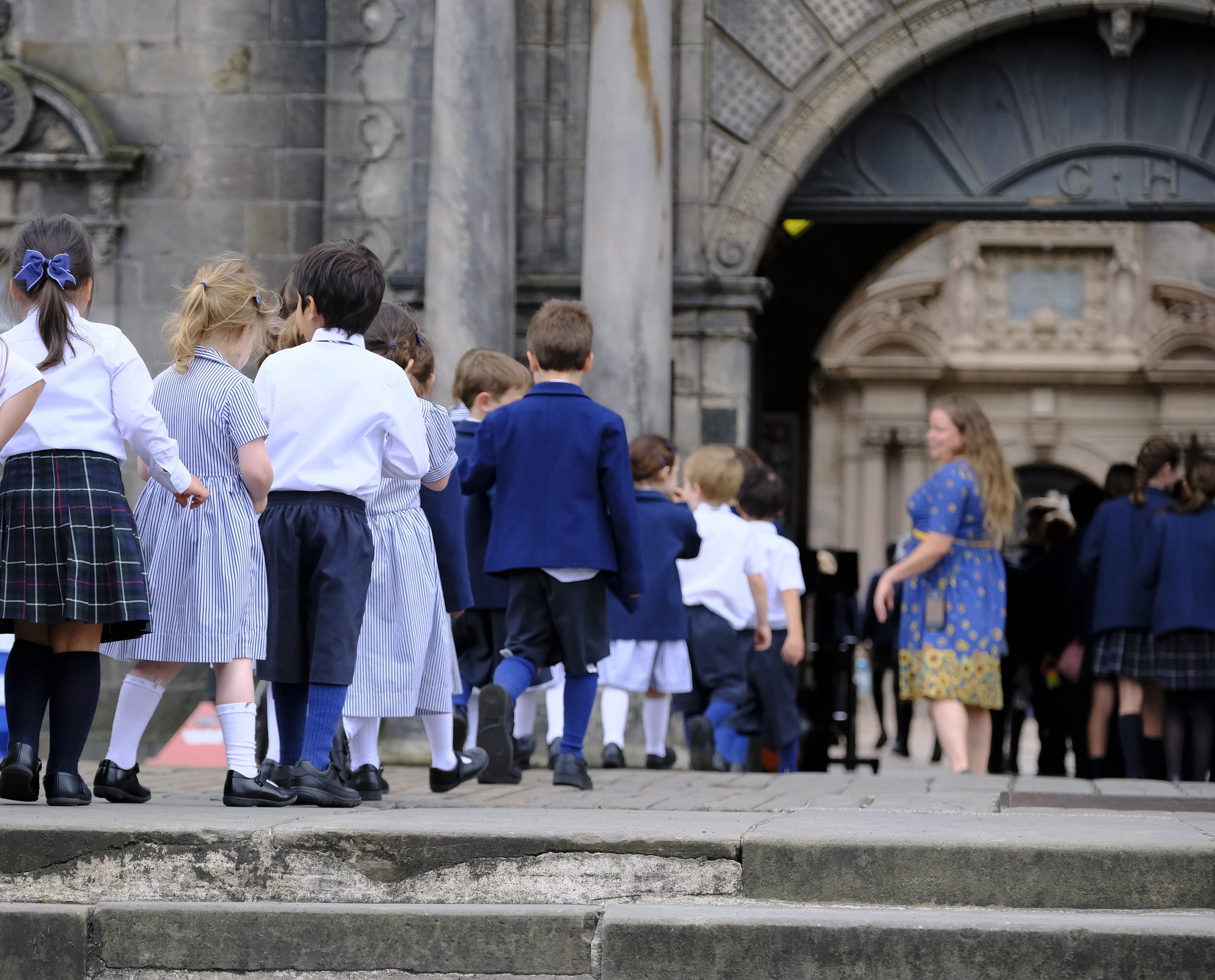 young children standing in a line